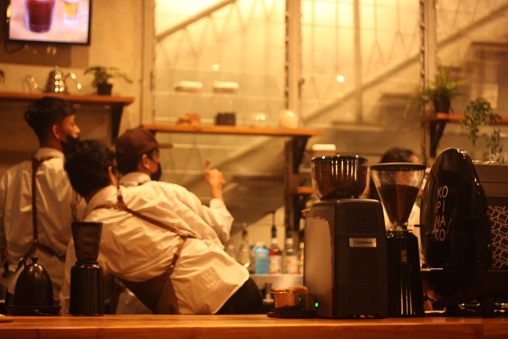 a couple of people sitting at a table