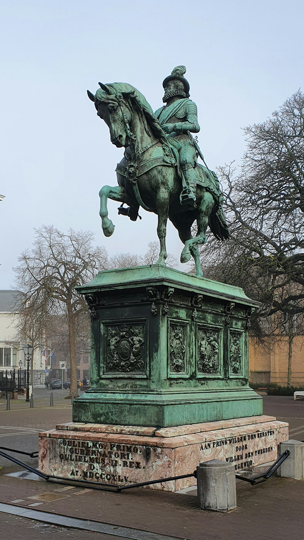 a statue of a man riding a horse