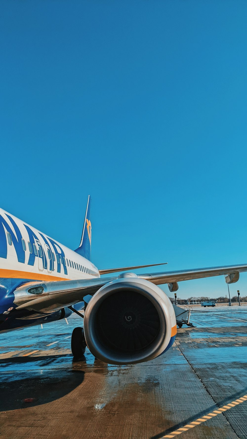 a large jetliner sitting on top of an airport tarmac