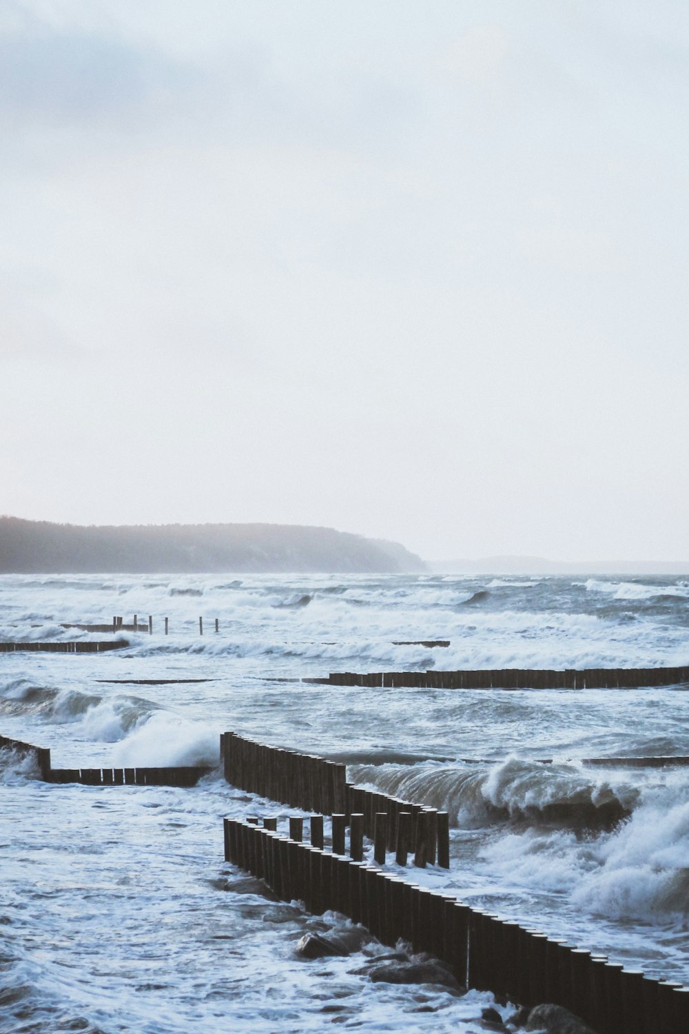 a large body of water with waves coming in to shore