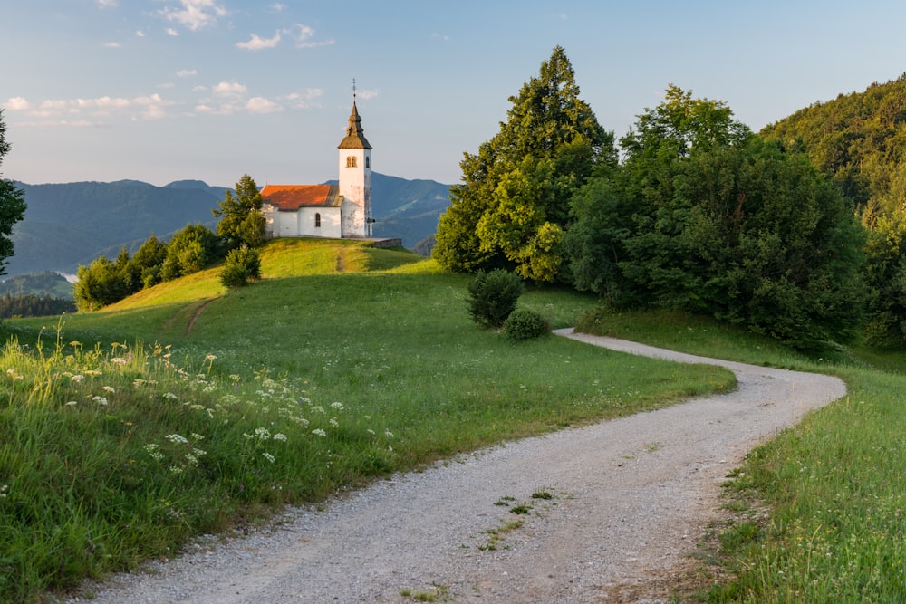 a small church on top of a hill