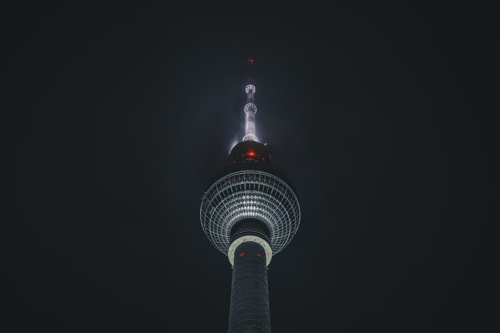 a tall tower with a light on top of it