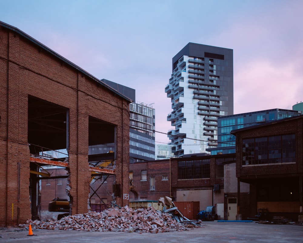 a large pile of rubble in front of a building