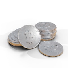 A pile of shiny silver coins decorated with a prominent Bitcoin symbol on the surface. Each coin is meticulously detailed, with engraved text encircling the central logo, indicating a digital currency motif.