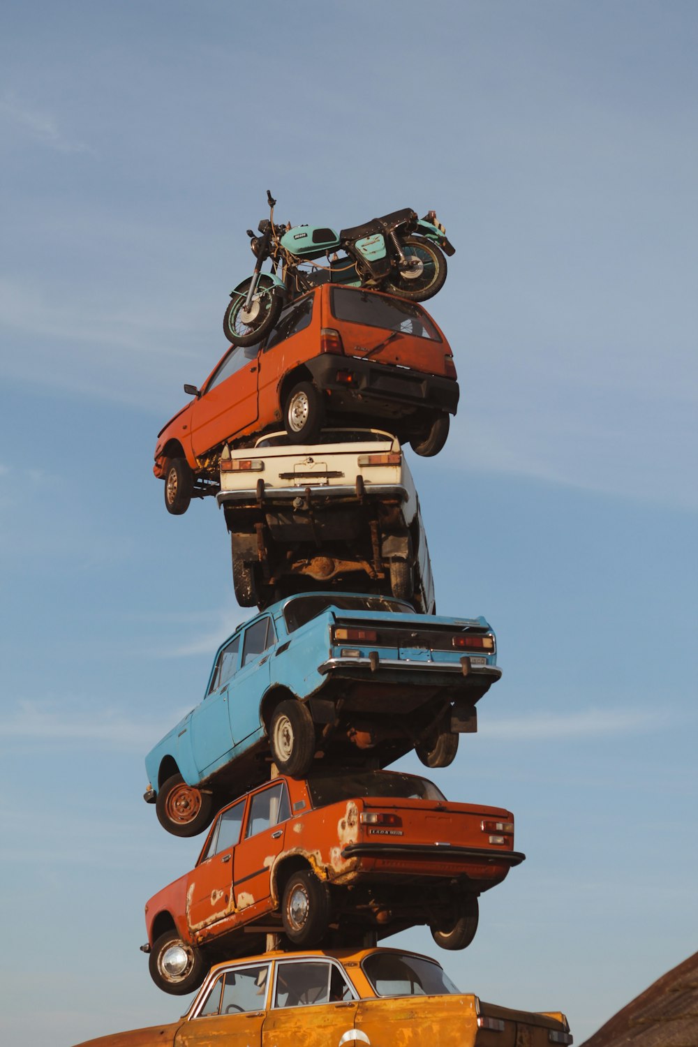 a group of cars stacked on top of each other