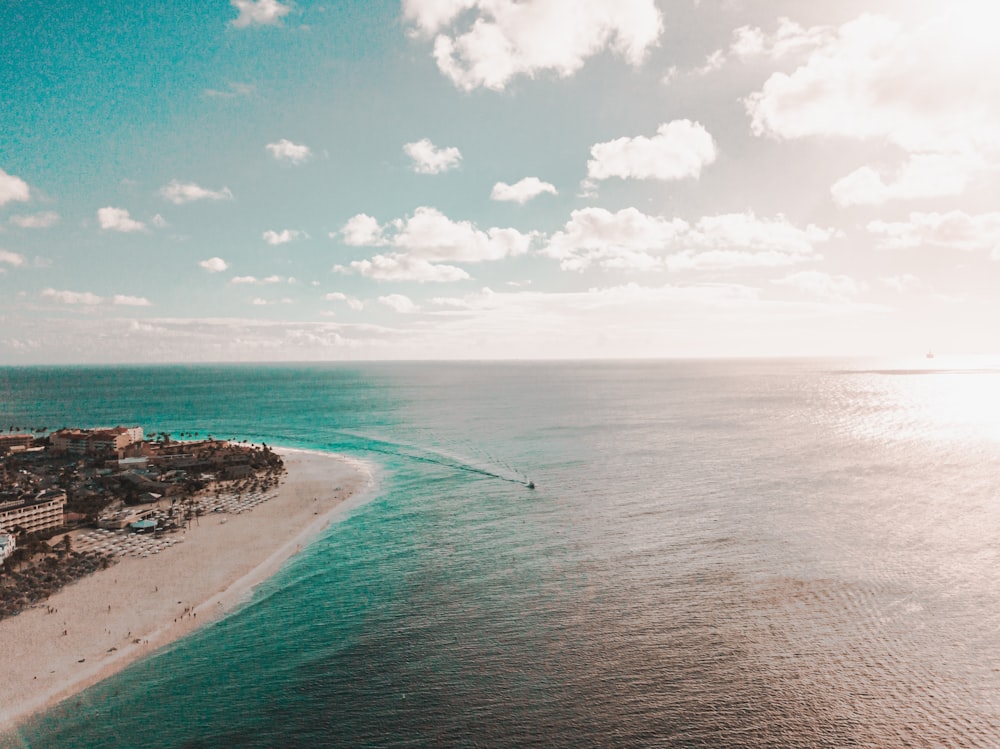 an aerial view of a beach and a body of water