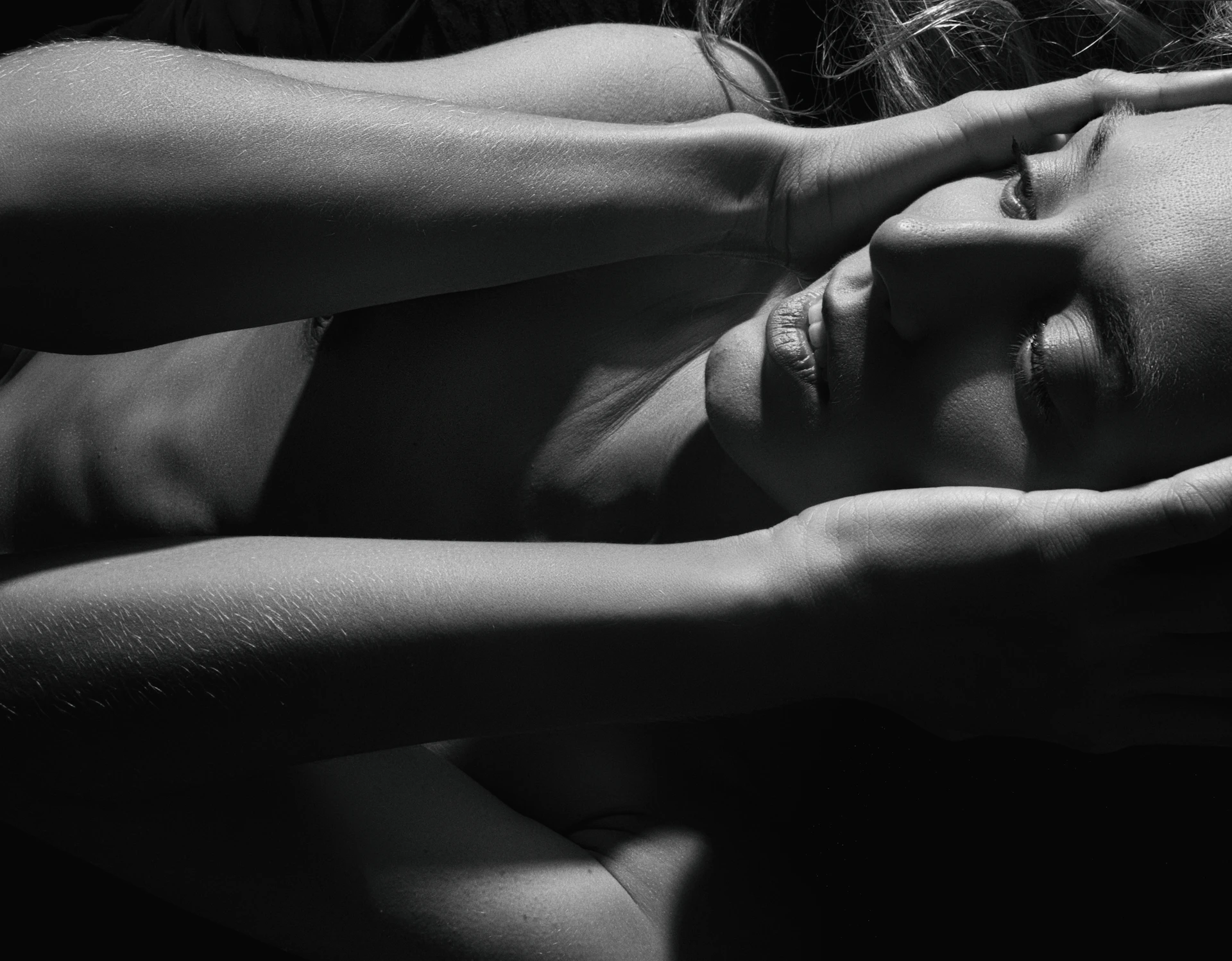 a black and white photo of a naked woman