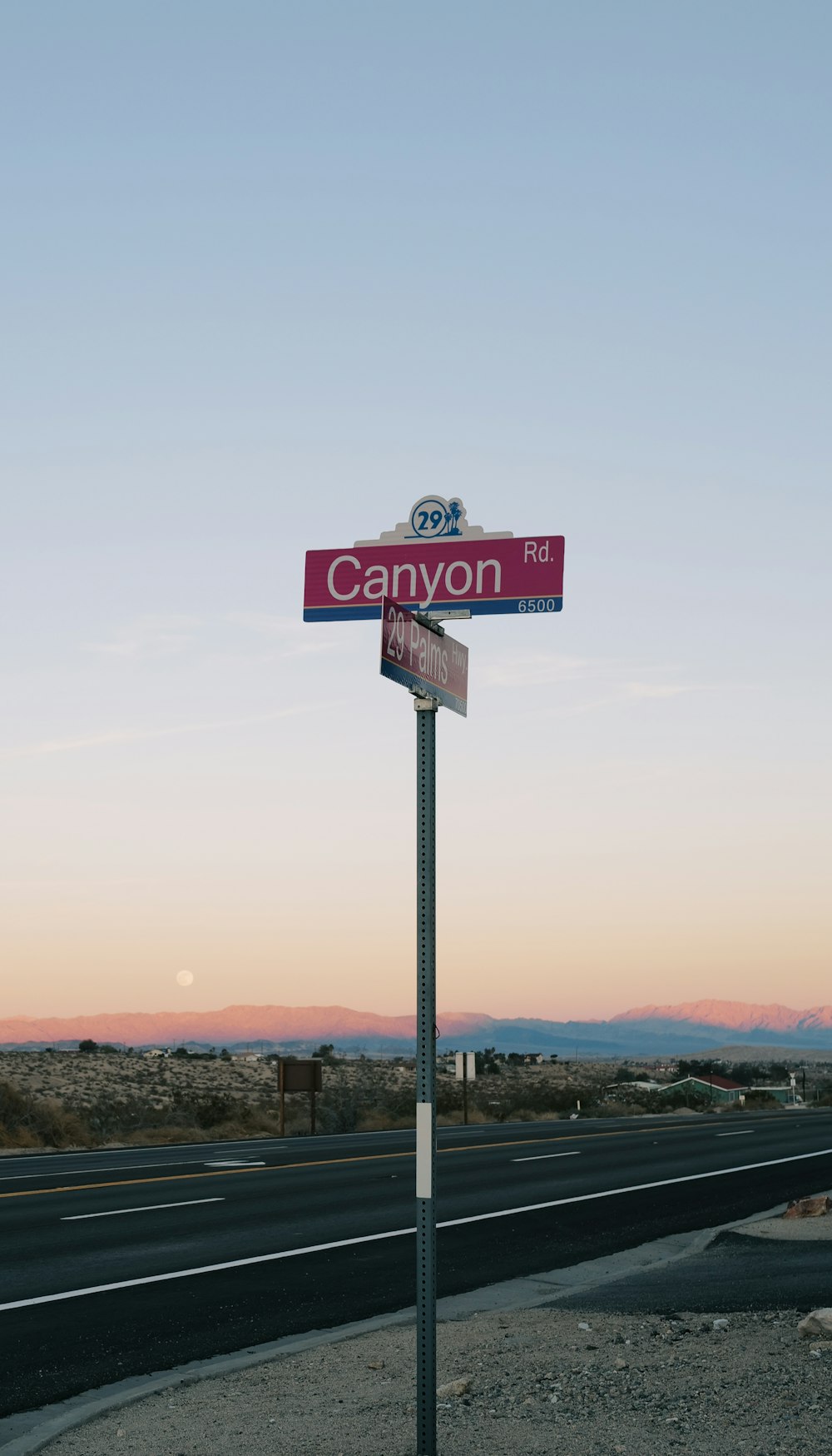 a street sign on the side of the road