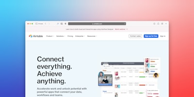 A web browser window displaying the Airtable website with navigation options such as Product, Solutions, Pricing, and more. The main content promotes a message to 'Connect everything. Achieve anything.' Below is a visual representation of a digital workspace with photos, charts, and various task panels. The background features a color gradient from blue to red.