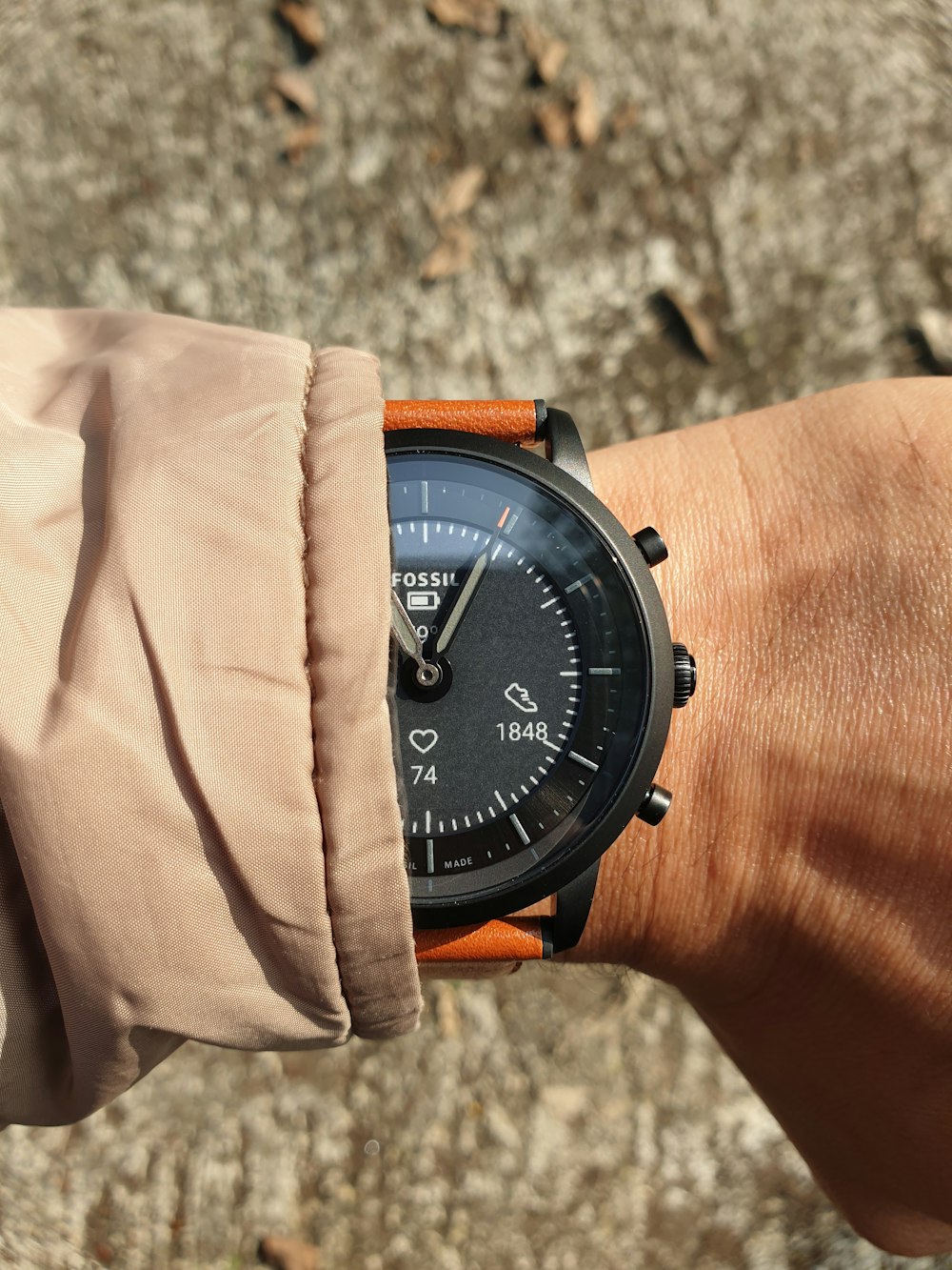 a close up of a person wearing a wrist watch