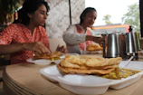Satisfied customer receiving perfectly maintained hot meal.