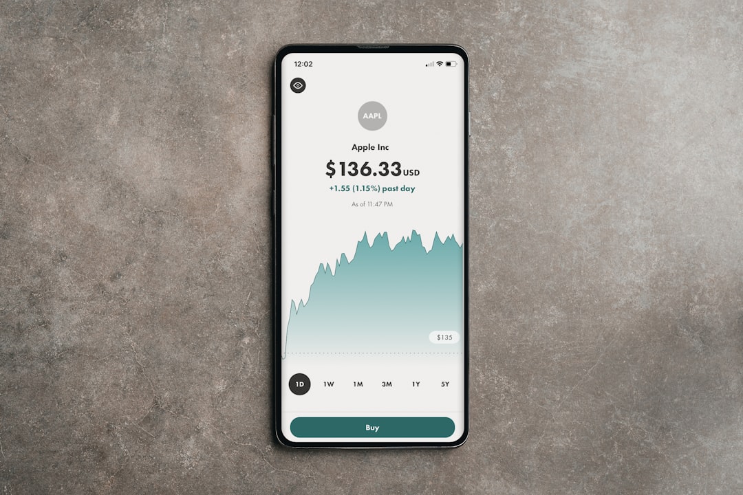 a cell phone displaying a price on a concrete surface, Easily buy and sell stocks with Wealthsimple Mobile stock trading</p>
<p></p>
<p>------</p>
<p>#apple #microsoft #investing #techstocks</p>
<p>