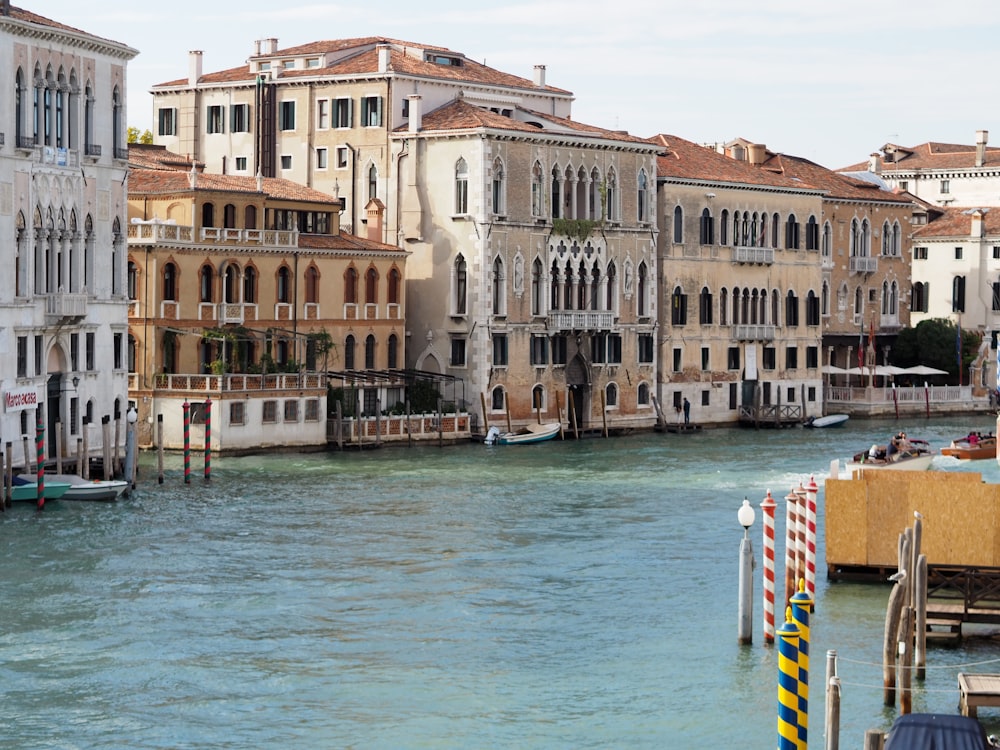 a waterway with a bunch of buildings on both sides of it