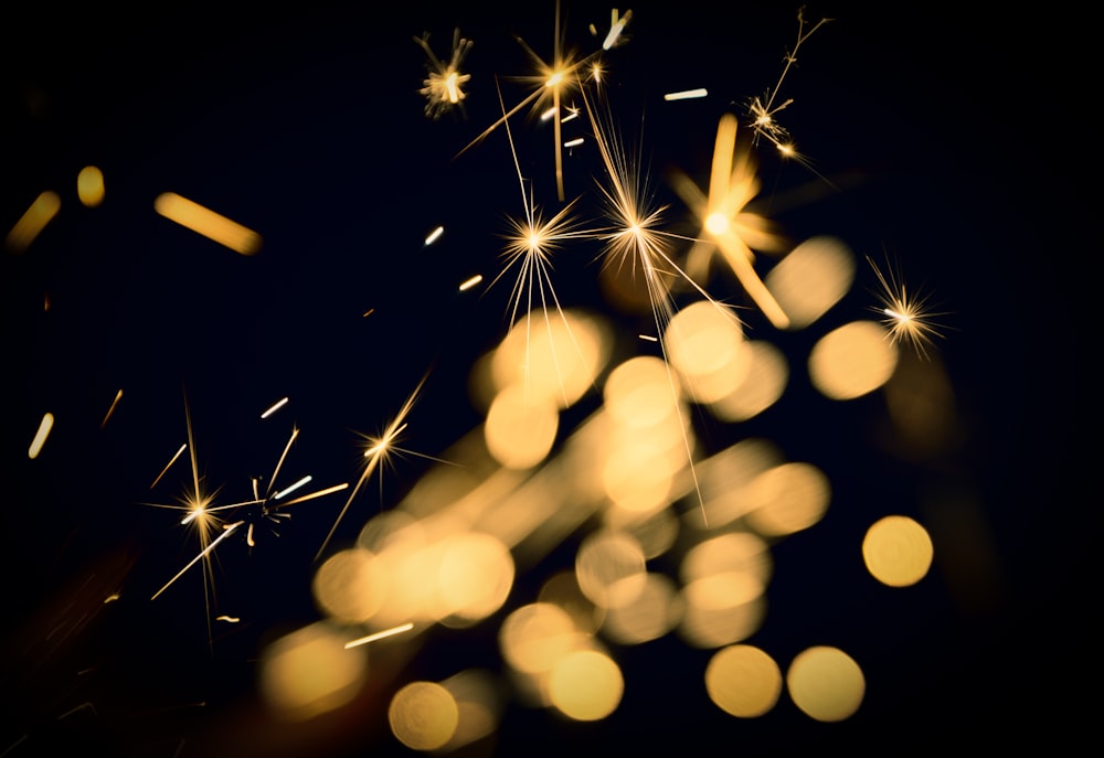 a close up of a sparkler on a black background