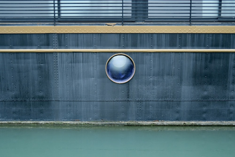 a round window on the side of a building