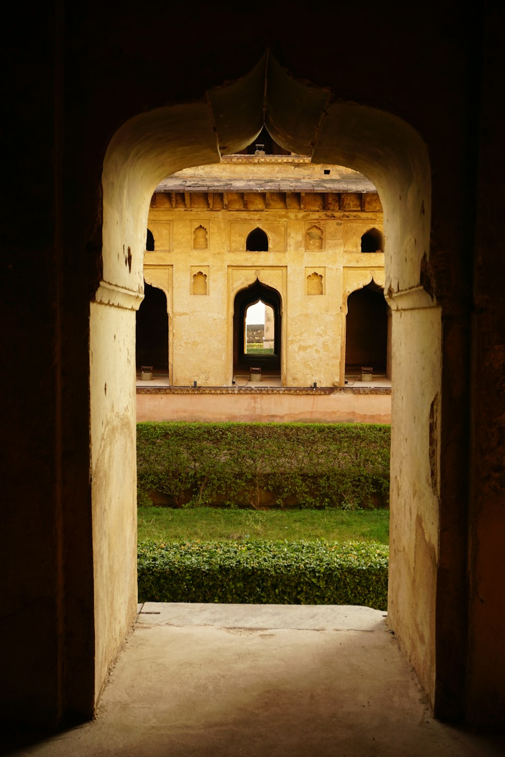 a view of a building through an archway