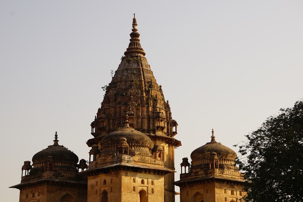 a very tall building with two towers on top of it