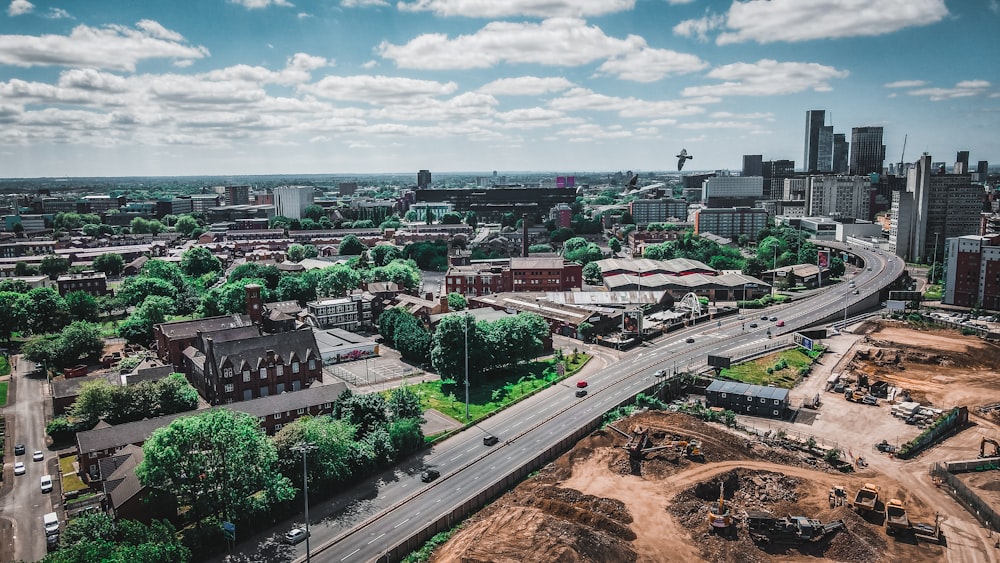 an aerial view of a city with lots of trees