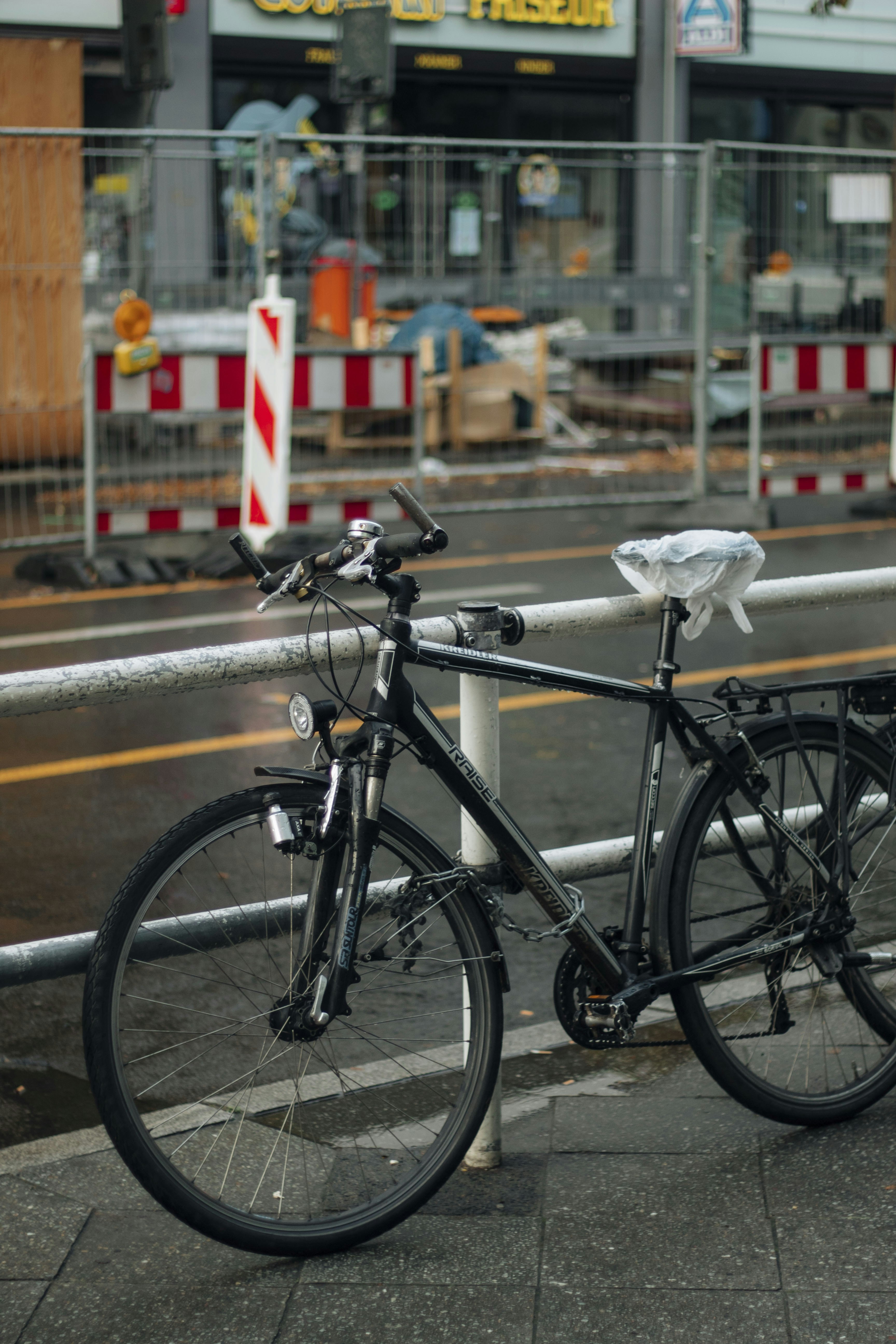 a bicycle parked on the side of the road