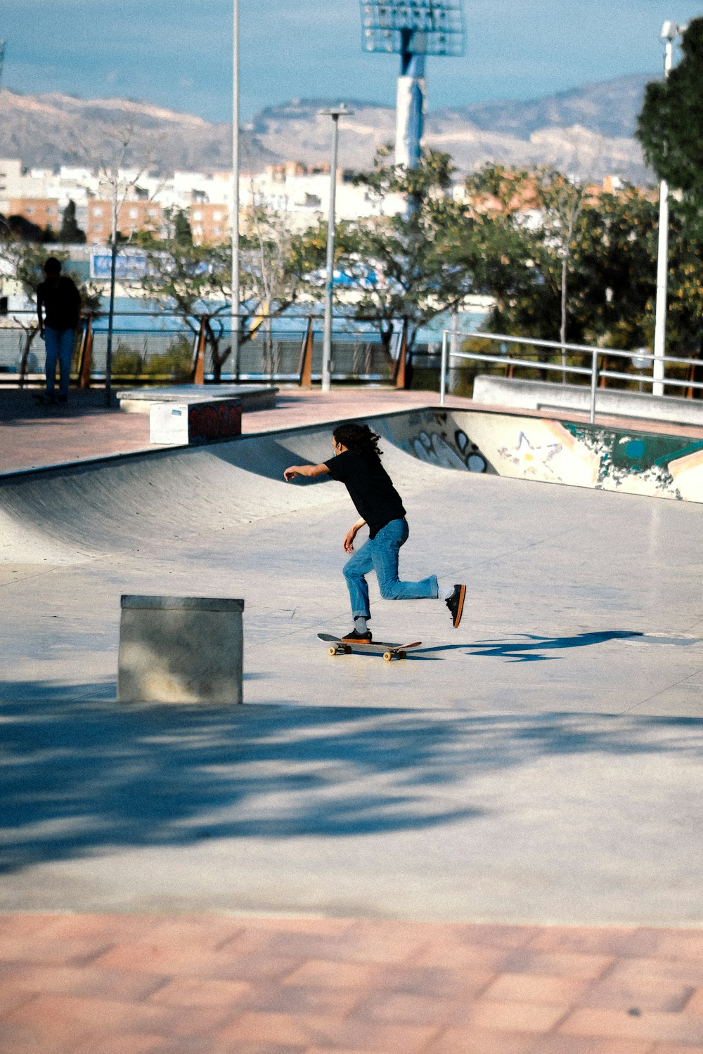 a man riding a skateboard down the side of a ramp