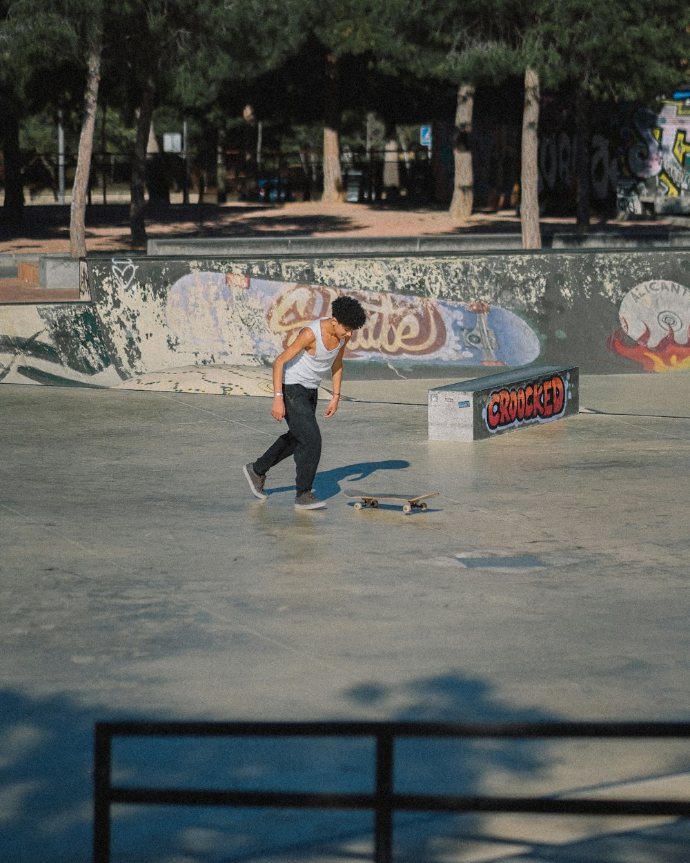 a man riding a skateboard at a skate park