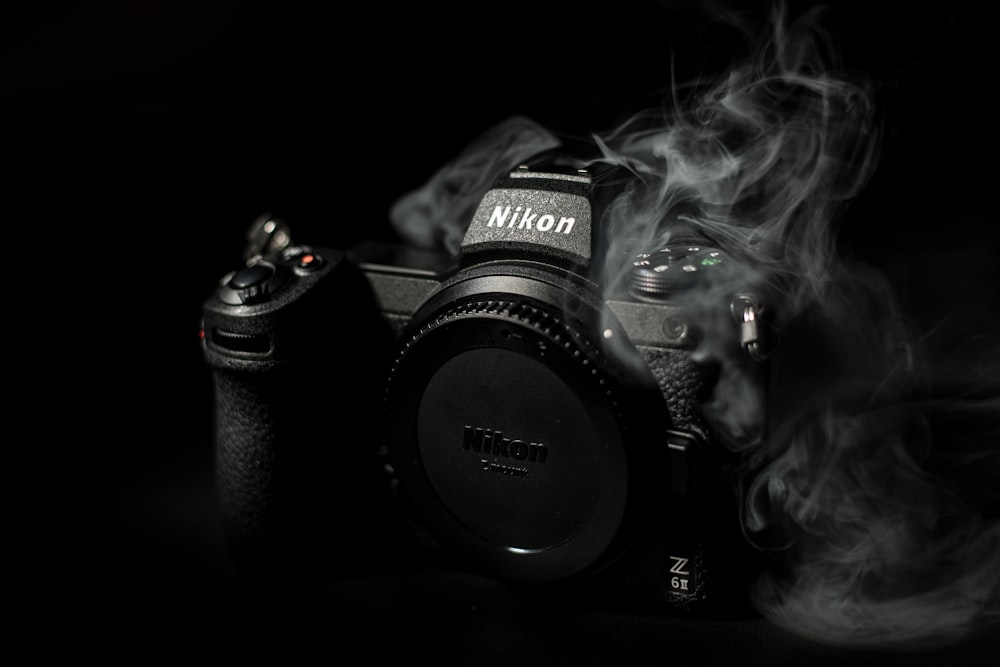a camera with smoke coming out of it