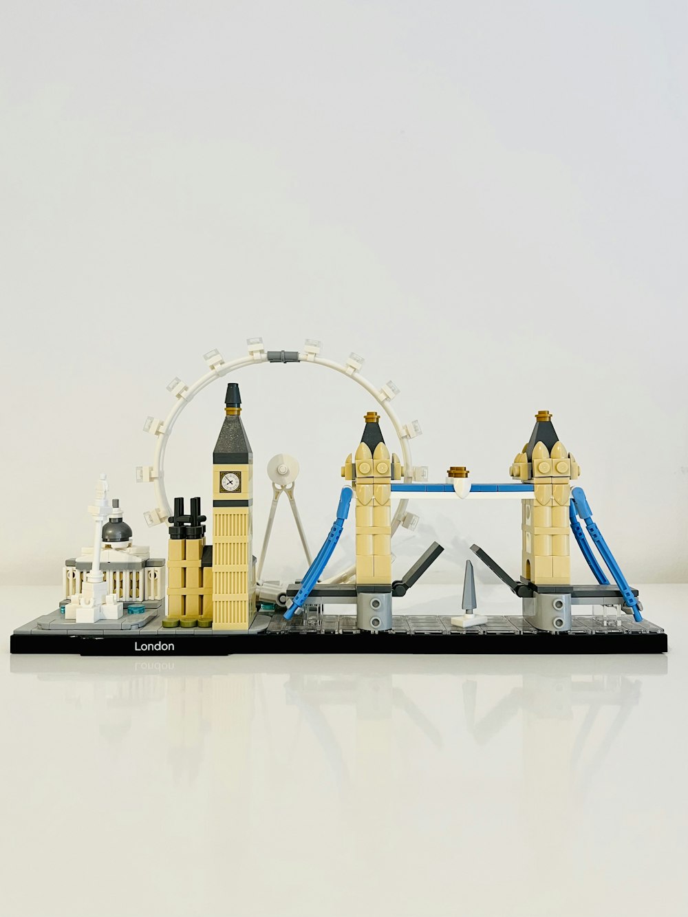 a lego model of a ferris wheel and fire hydrants