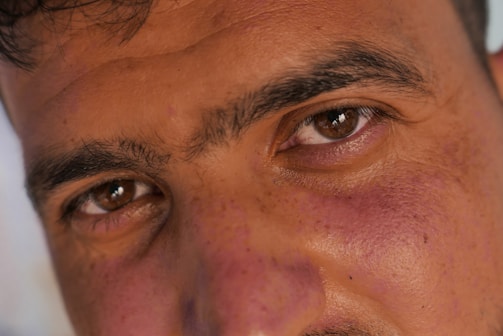 Close-up of a 3D character's intricate facial features and expressive eyes.