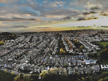 an aerial view of a city with lots of houses