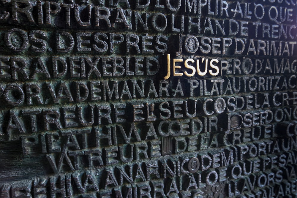 a close up of a wall with words written on it