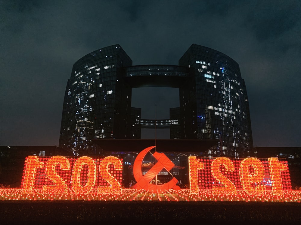 a large sign that is lit up in the dark