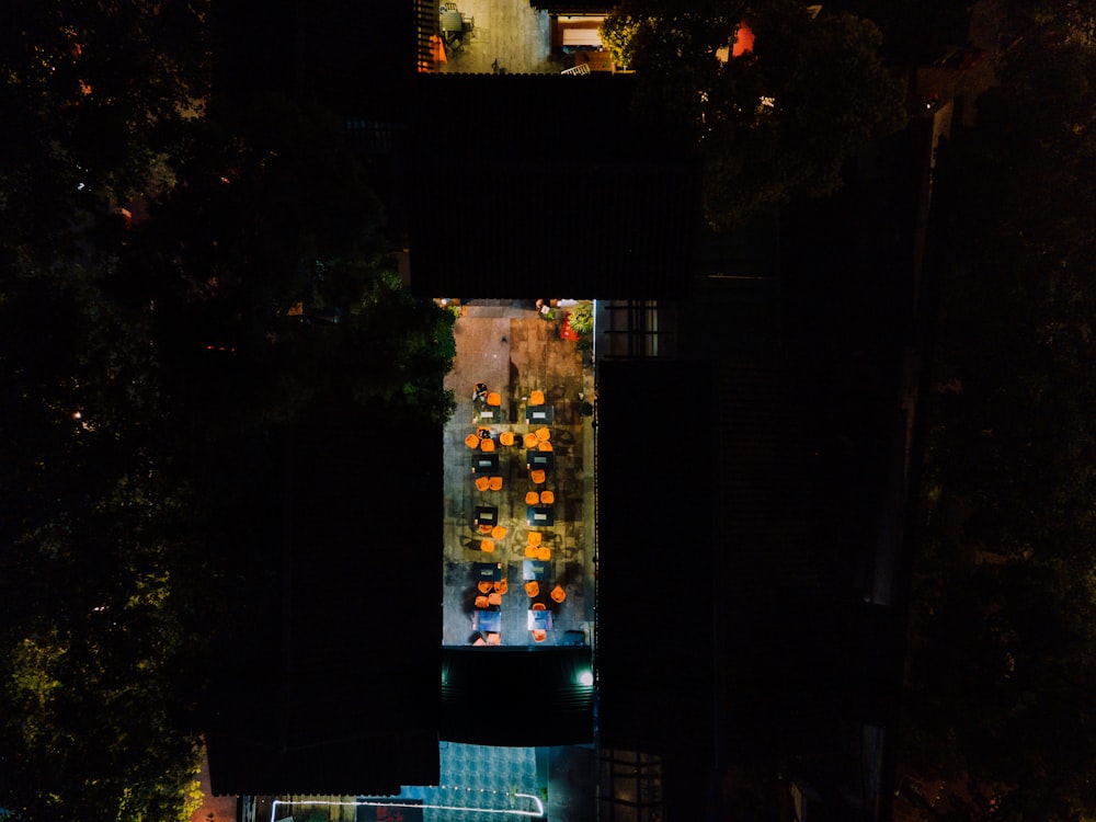 an aerial view of a city street at night