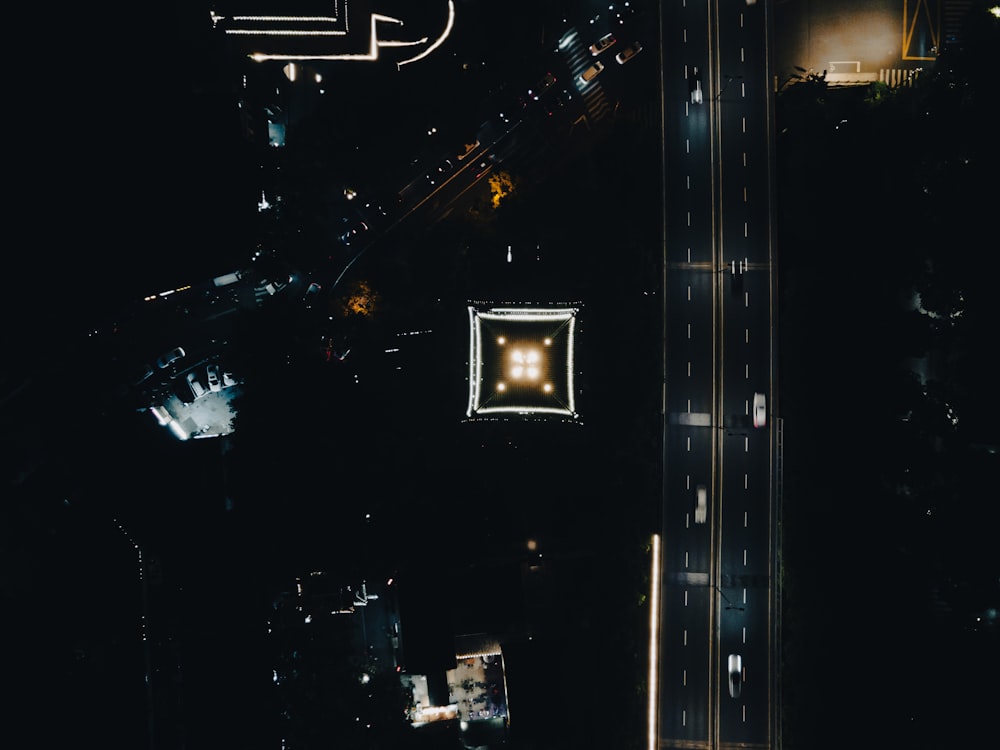 an aerial view of a street at night
