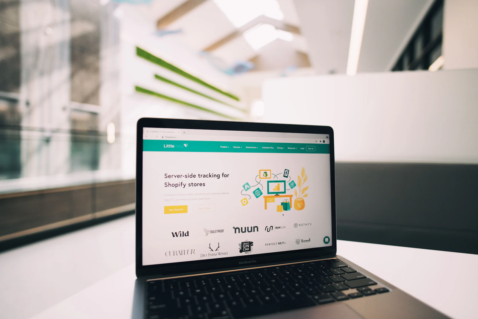 Laptop displaying an ecommerce dashboard for selling digital products