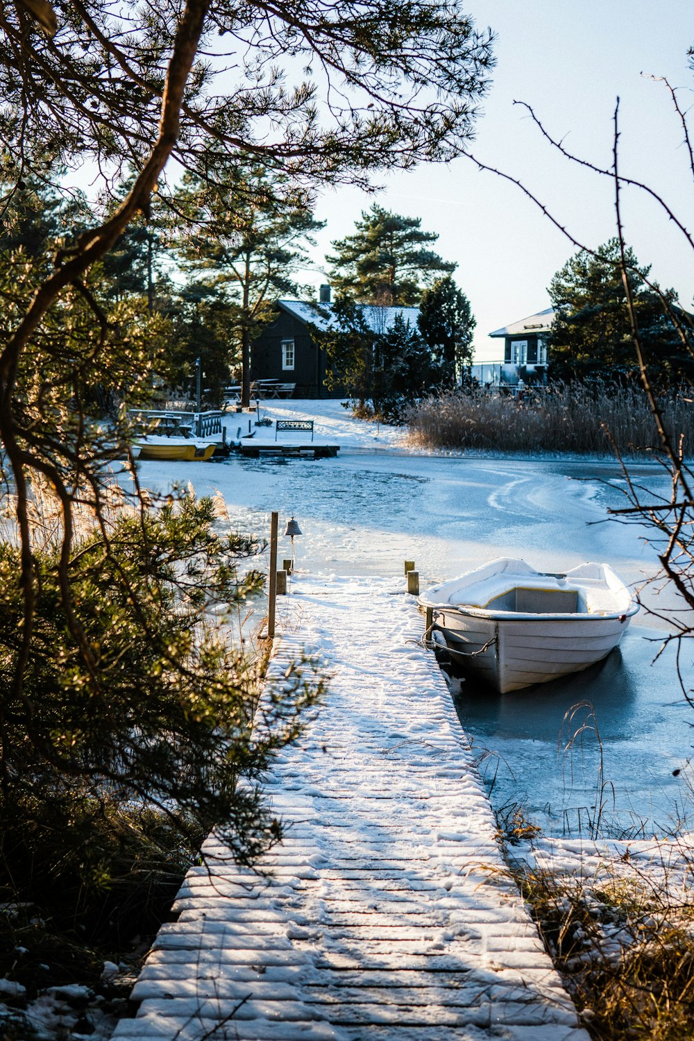 a boat sitting on top of a wooden dock