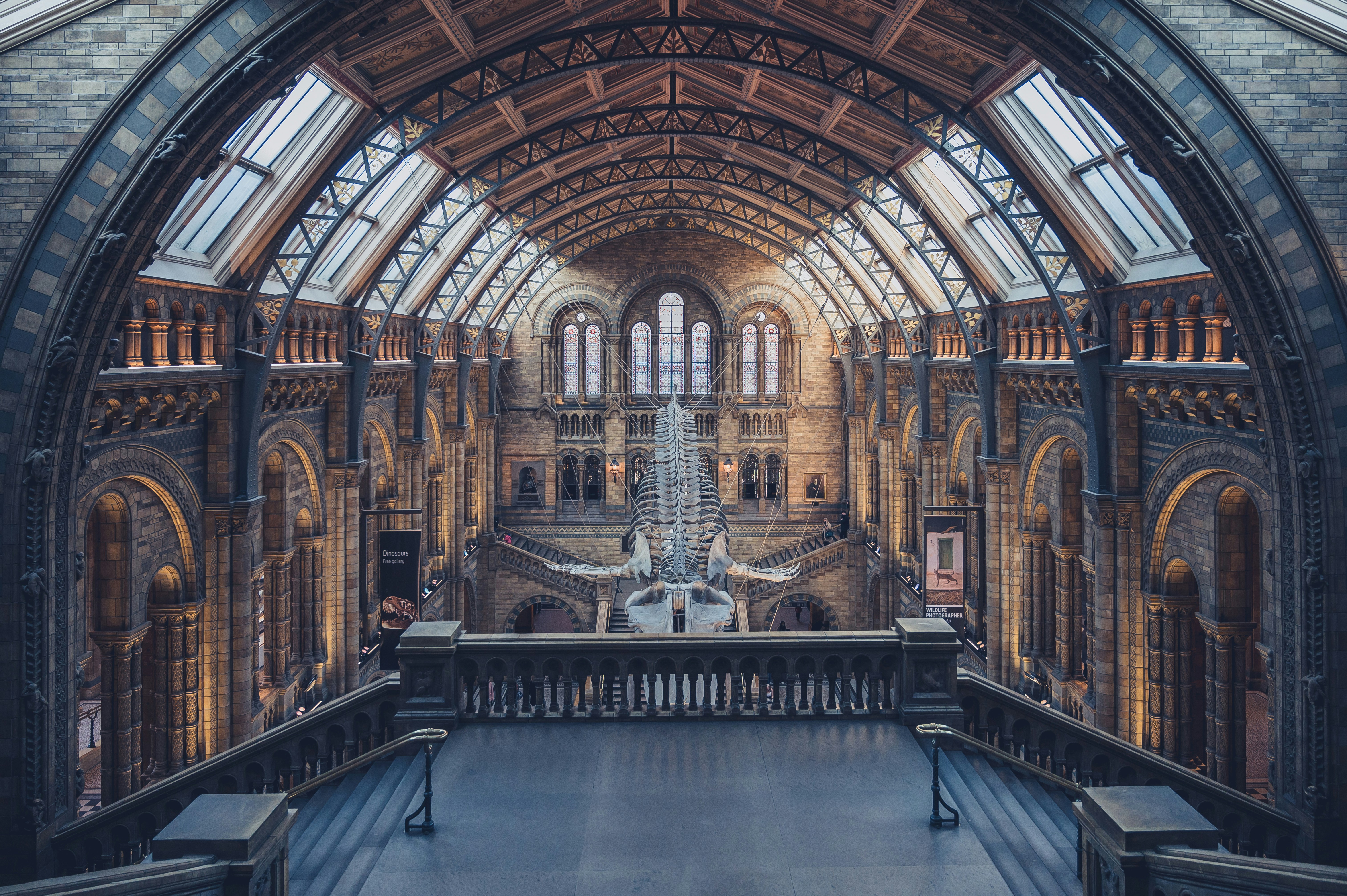 the inside of a building with a very tall ceiling