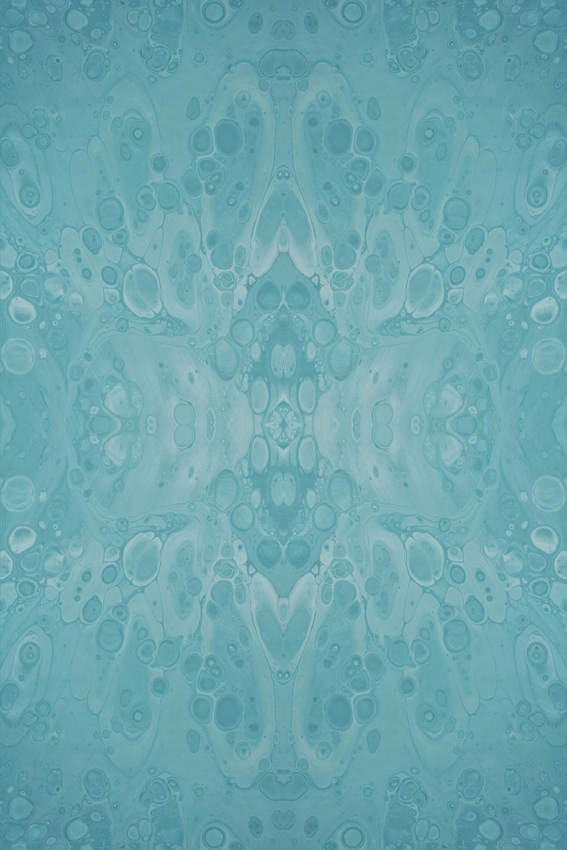 a blue background with a pattern of bubbles