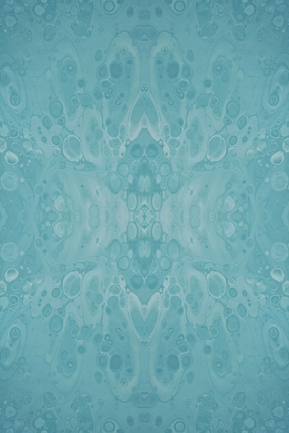 a blue background with a pattern of bubbles