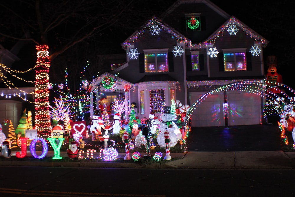 a house covered in christmas lights and decorations