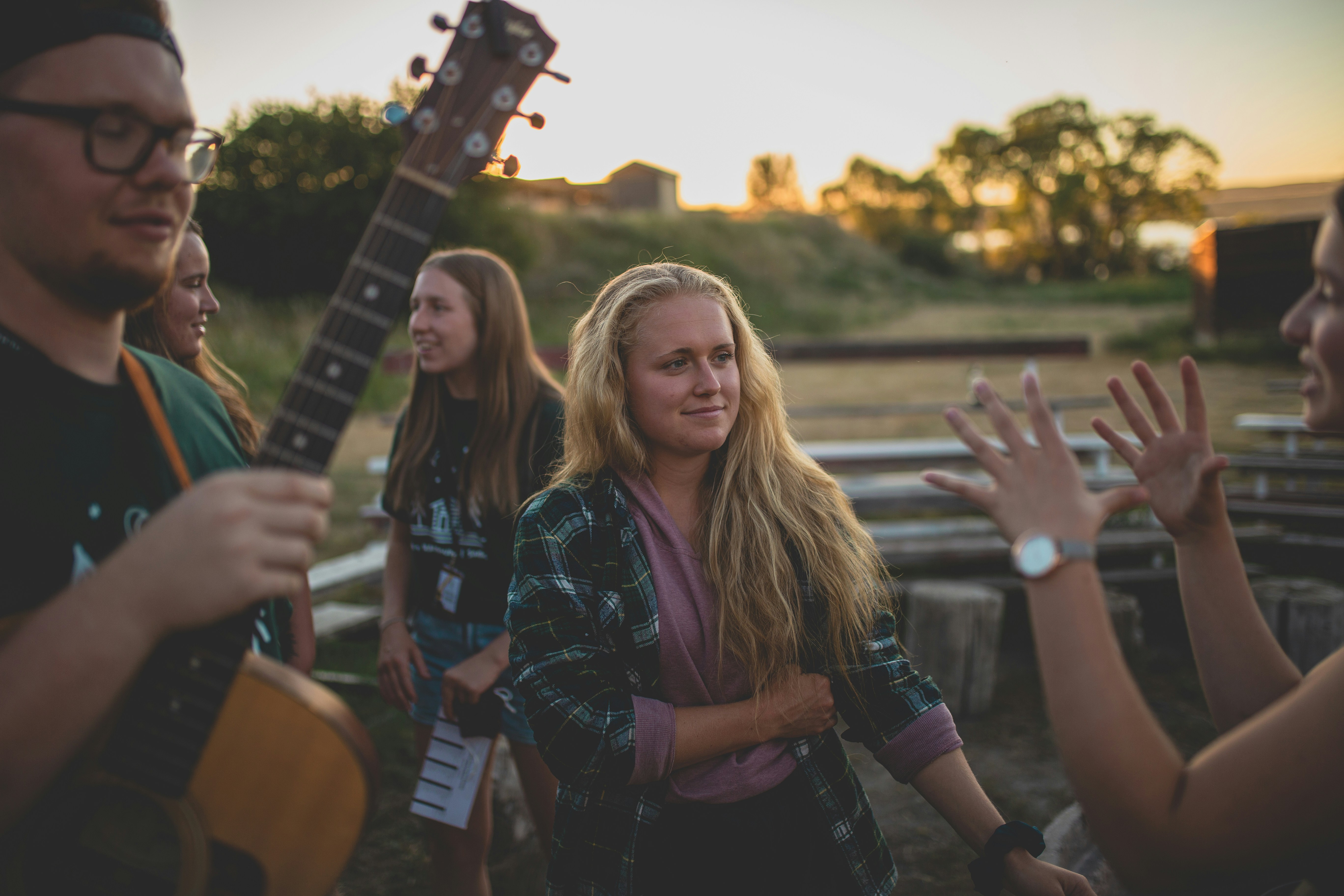 a group of people standing next to each other