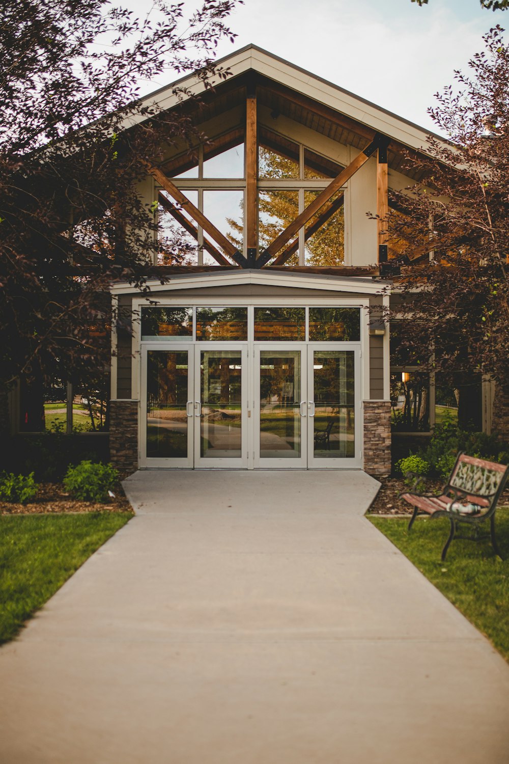 a bench sitting in front of a building