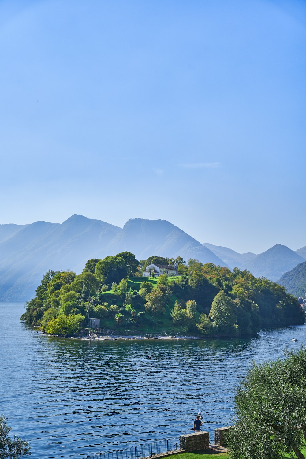 a small island in the middle of a lake