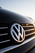 a close up of a volkswagen emblem on a car