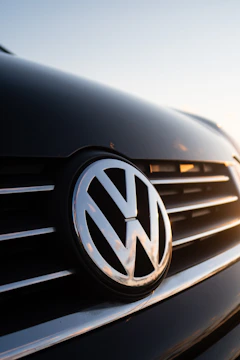 a close up of a volkswagen emblem on a car