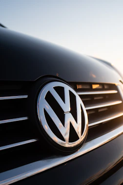 a close up of a volkswagen emblem on a car