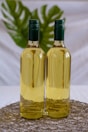 a couple of bottles of wine sitting on top of a table