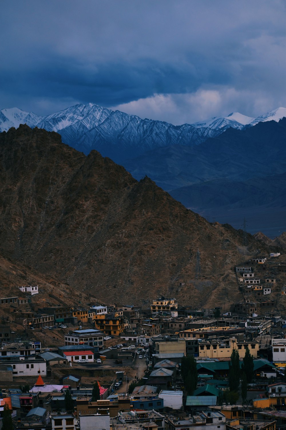 a city with mountains in the background