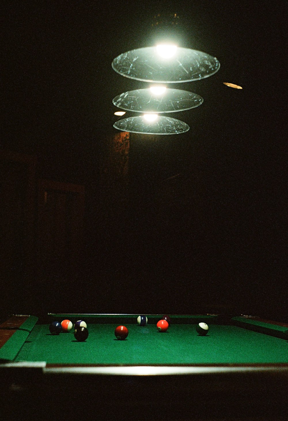 a pool table with a pool ball on it