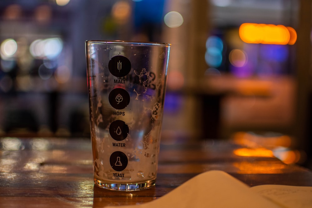 a close up of a glass on a table