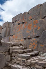 a stone wall with steps leading up to it